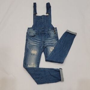 Machine size small distressed overalls. 29" inseam. Like new pre-owned condition